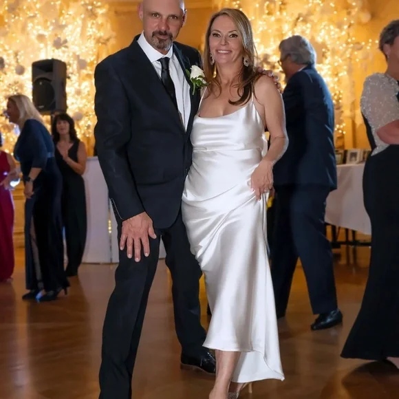 Two bridal gowns in excellent condition.Plus shoes.